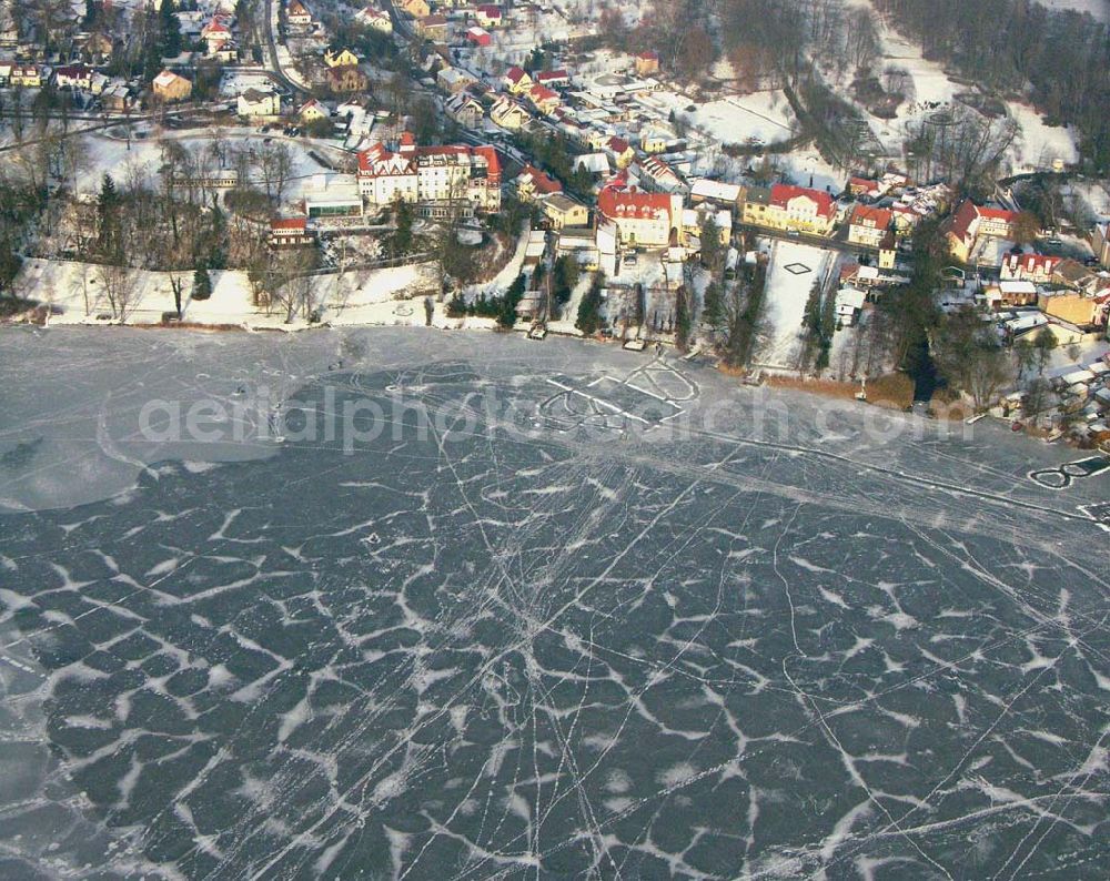 Aerial image Buckow / Brandenburg - 24.01.2006 Buckow / Brandenburg Blick auf die winterlich verschneite Kurstadt Buckow am Schermüzelsee.