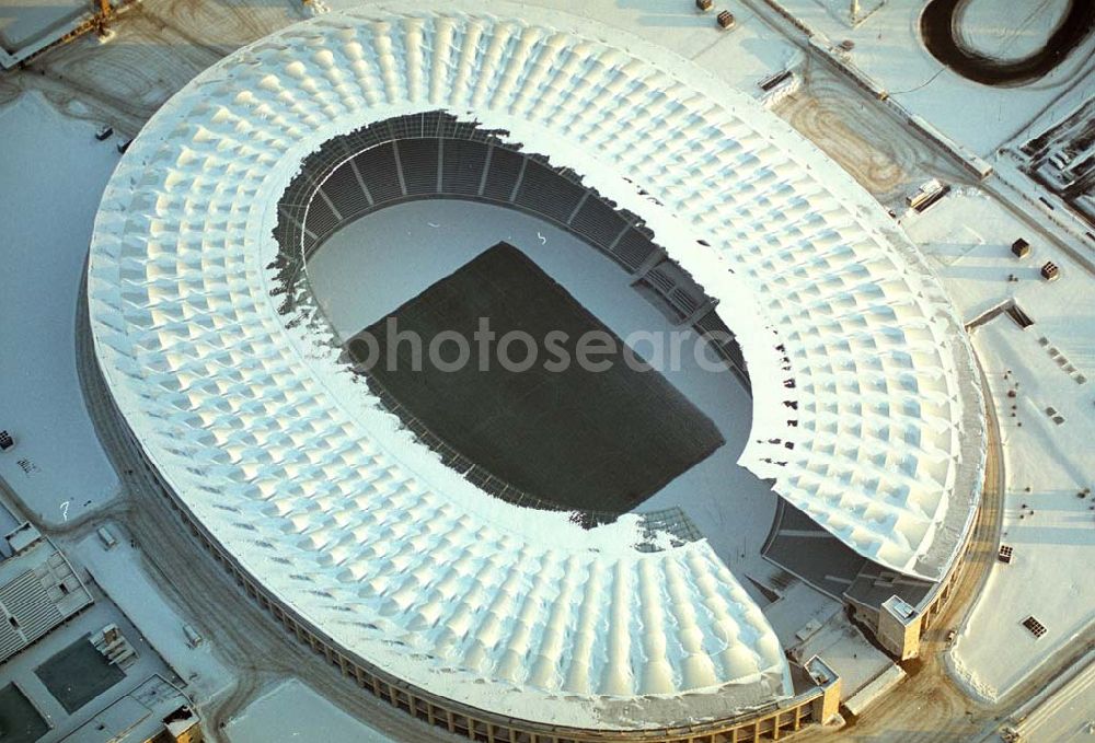 Berlin from the bird's eye view: Winterstimmung am Berliner Olympiastadion -Olympiastadion Berlin GmbH,Olympischer Platz 3,14053 Berlin,Tel.: +49 (0)30 306 88 100, Architekten: gmp Gerkan, Marg & Partner Hamburg. Werbliche Nutzungs nur nach vorheriger Absprache !.