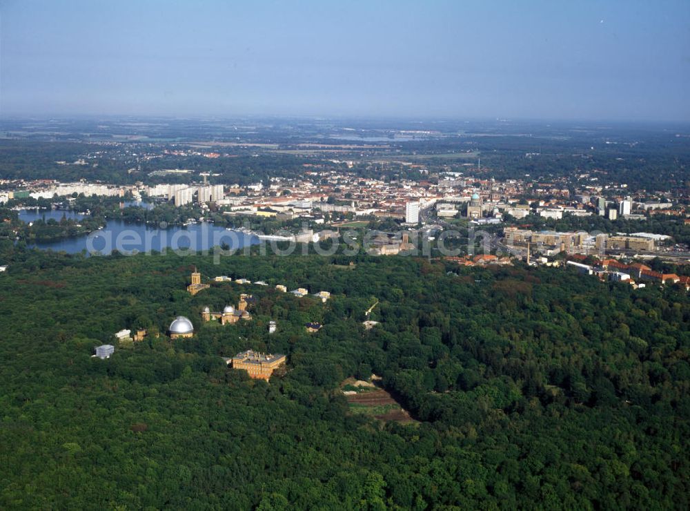 Aerial photograph Potsdam - Blick auf den Wissenschaftspark Albert Einstein auf dem Telegrafenberg in Potsdam. Das Gelände besteht aus verschiedenen astronomischen, meteorologischen und geowissenschaftlichen Observatorien umgeben von einem englischen Landschaftsgarten. Zu den sichtbaren Gebäuden gehören: der Einsteinturm und der Große Refraktor / Teleskop, Teile des Astrophysikalischen Institut Potsdam; das Michelsonhaus, von 1876 bis 1879 das Hauptgebäude des Astrophysikalischen Observatoriums; das Süring Haus, Meteorologisches Observatorium einschließlich eines geomagnetisches Observatoriums; das Helmert-Haus, ehemaliges Geodätisches Institut. Heute sind auf dem Telegrafenberg das GeoForschungsZentrum (GFZ), das Potsdam-Institut für Klimafolgenforschung (PIK), die Säkularstation Potsdam und die AWI-Forschungsstelle Potsdam beheimatet.