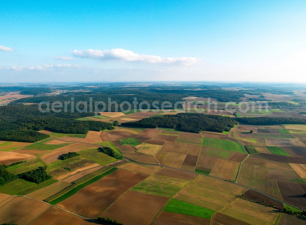 Zellingen from above - Forest and agricultural fields in Zellingen in the state of Bavaria. The region in the Main-Spessart district around the Duttenbrunn hamlet is mainly used for agriculture and forestry and consists mostly of forests and colorful fields