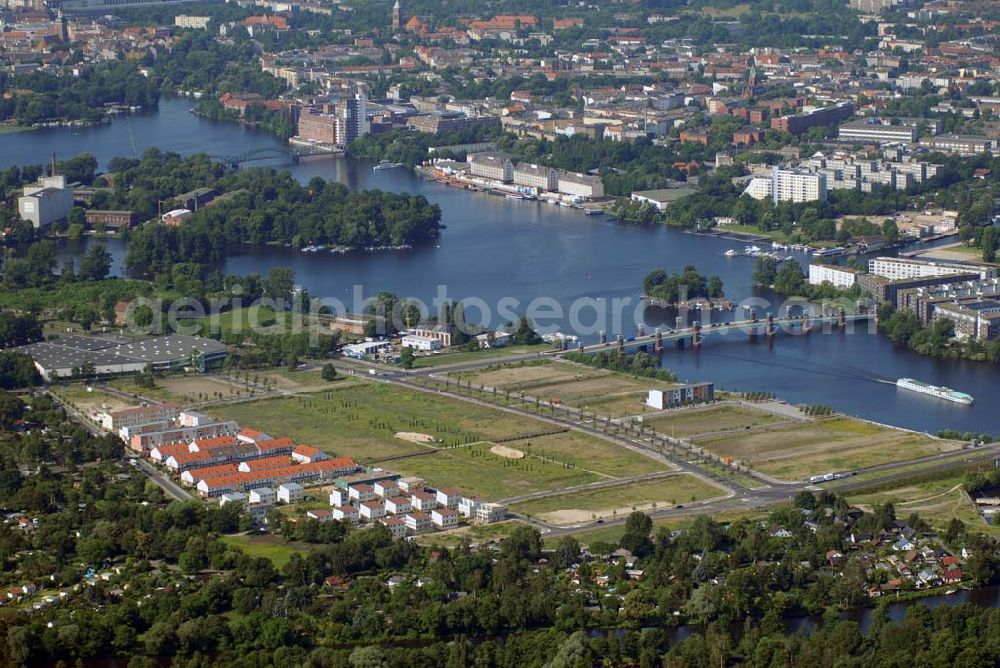 Aerial image Berlin - Blick auf die Wohn- und Bebauungsflächen der Wasserstadt Spandau am Spandauer See. Träger ist die landeseigene Wasserstadt GmbH,Treuhänderischer Entwicklungsträger des Landes Berlin, Eiswerderstraße 18 in 13585 Berlin,Telefon: 030.35 59 01-0,Telefax: 030.35 59 01-99,E-mail: zentrale@wasserstadt.de