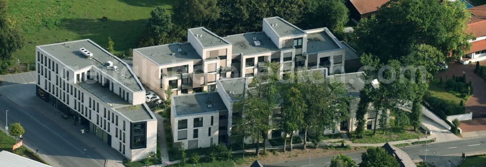 Aerial image Cloppenburg - Residential and commercial building Schuetzenstrasse - Emsteker street in Cloppenburg in the state Lower Saxony. In the picture is a bakery