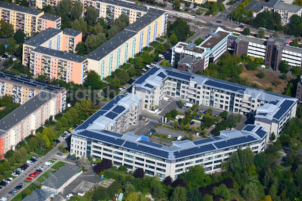 Berlin from the bird's eye view: Residential and commercial building along of Doebelner Strasse in the district Hellersdorf in Berlin, Germany