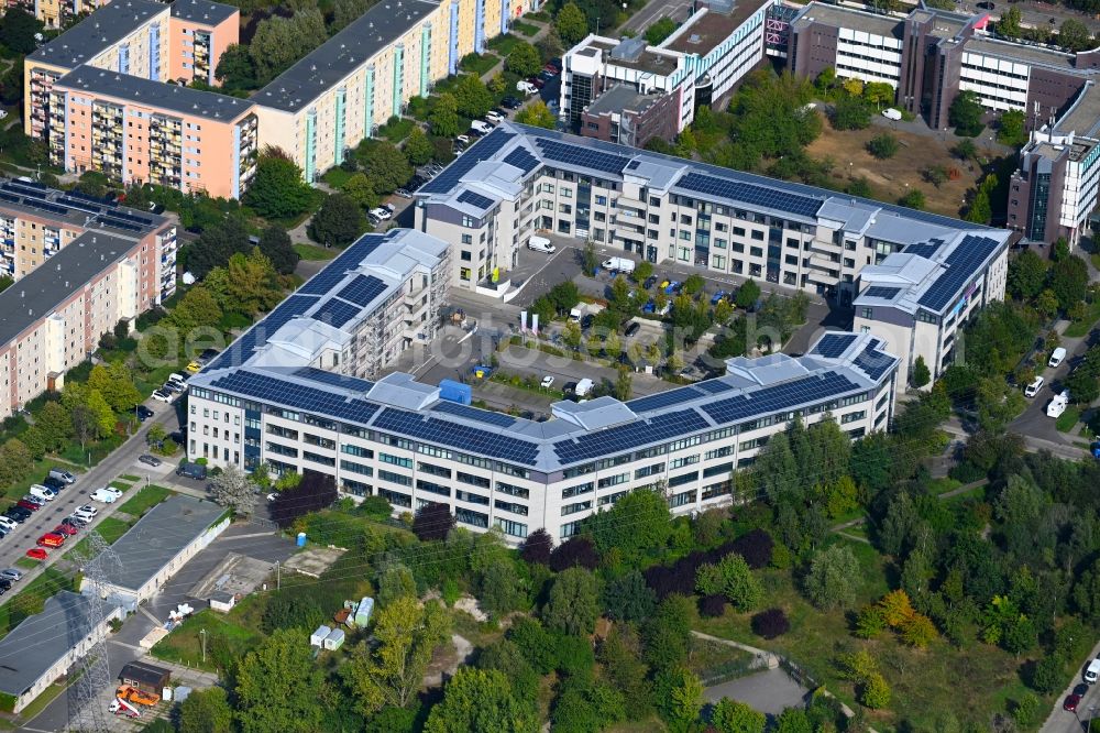 Aerial image Berlin - Residential and commercial building along of Doebelner Strasse in the district Hellersdorf in Berlin, Germany