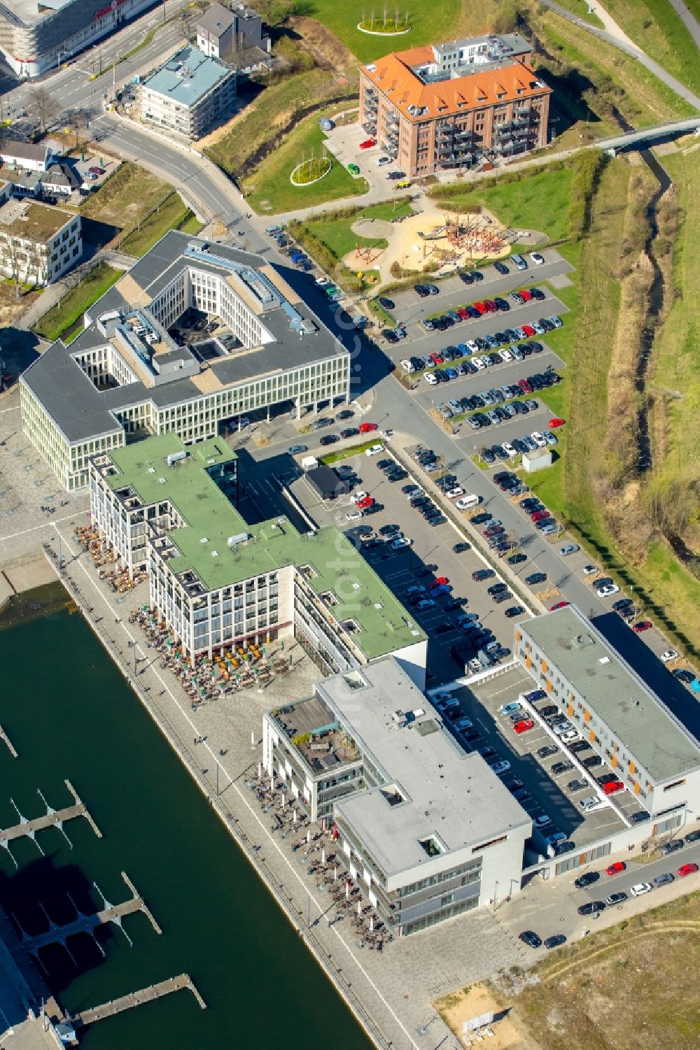 Dortmund from the bird's eye view: Residential and commercial building along of Hafenpromendade in Dortmund in the state North Rhine-Westphalia, Germany