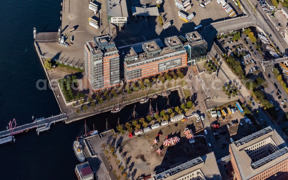 Kiel from the bird's eye view: Residential and commercial building on the shore of the Germaniahafen harbor basin in Kiel in the state Schleswig-Holstein, Germany