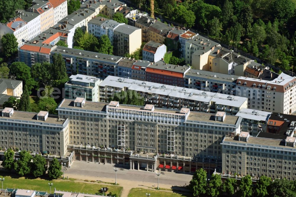 Aerial image Berlin - Residential and commercial building at the Karl Marx Allee in the district Friedrichshain-Kreuzberg in Berlin, Germany