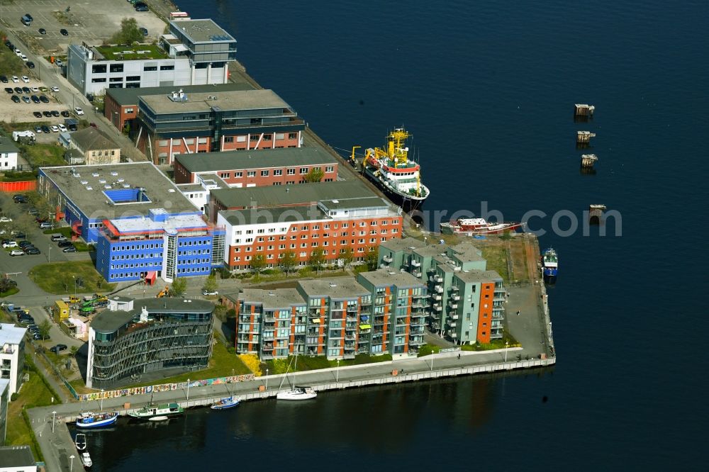 Aerial image Rostock - Residential and commercial building on Neptunallee in Rostock in the state Mecklenburg - Western Pomerania, Germany