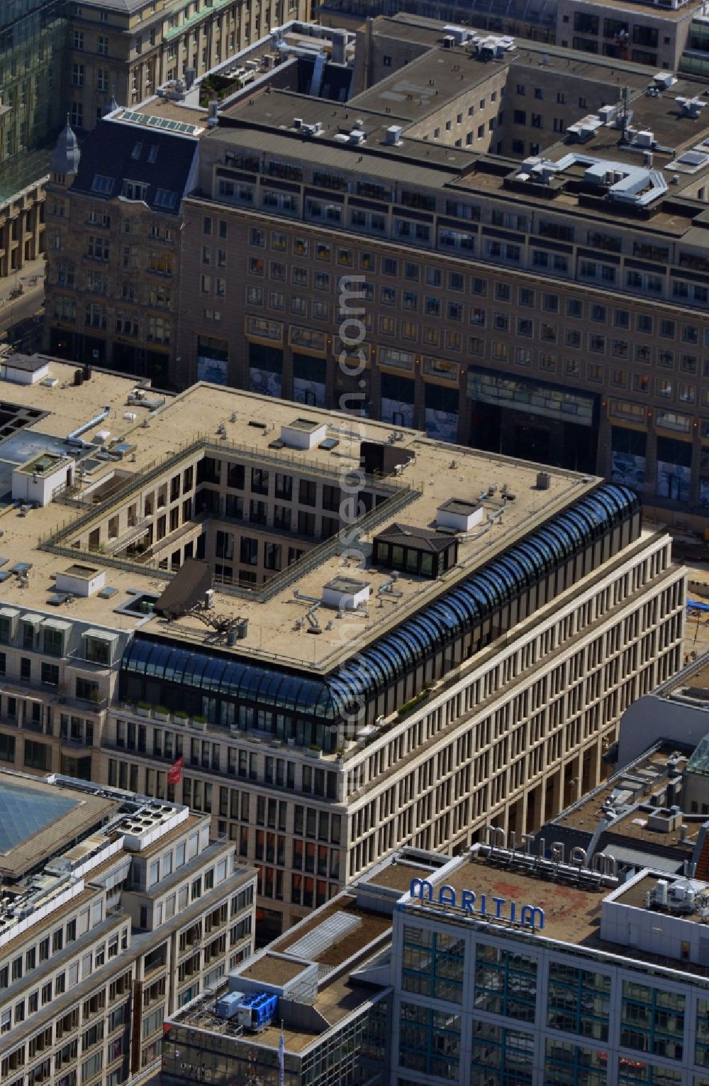 Berlin Mitte from the bird's eye view: Residential and commercial building-construction of MEAG on Unter den Linden corner of Friedrichstrasse in Berlin Mitte