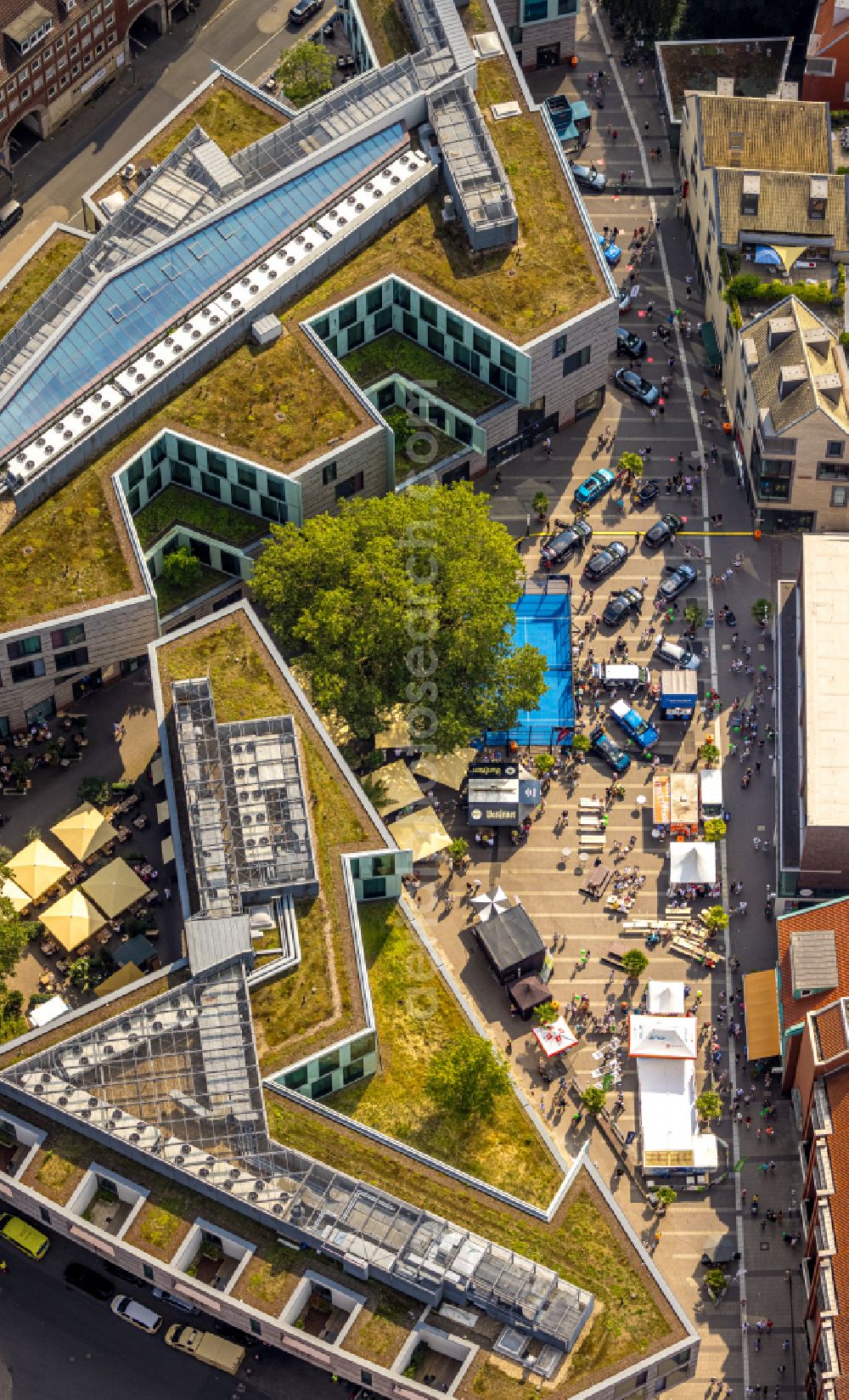 Aerial image Münster - Facade and roof construction of a residential and commercial building Stubengasse - Hansecarre on the street Stubengasse in the Altstadt district of Muenster in the federal state of North Rhine-Westphalia, Germany