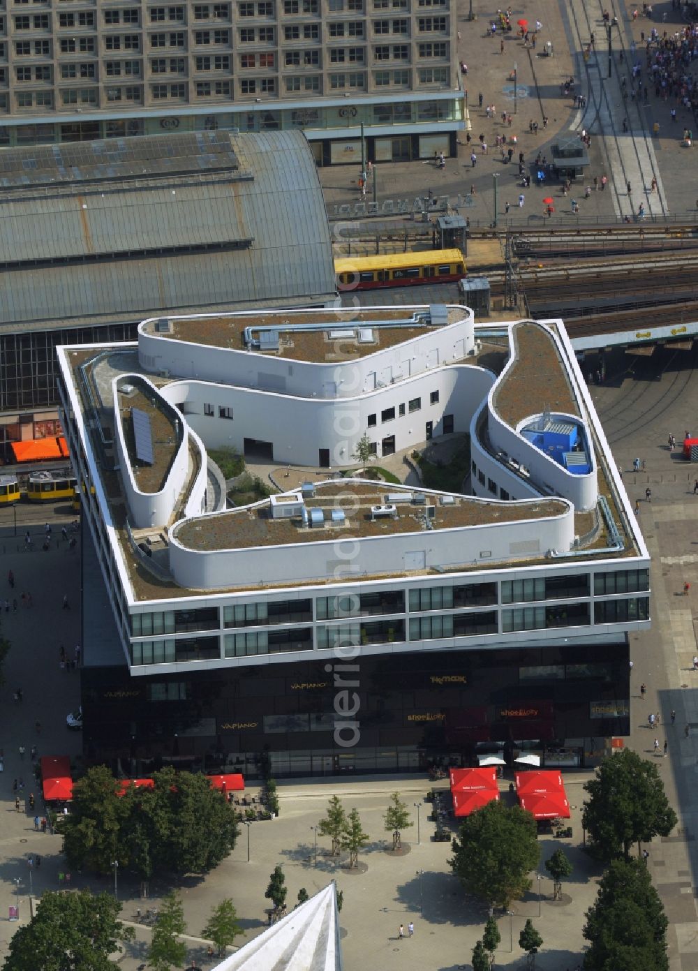 Berlin from the bird's eye view: Residential and commercial building Alea 101 of Redevco Services Deutschland GmbH on regional train station Alexanderplatz in Berlin, Germany