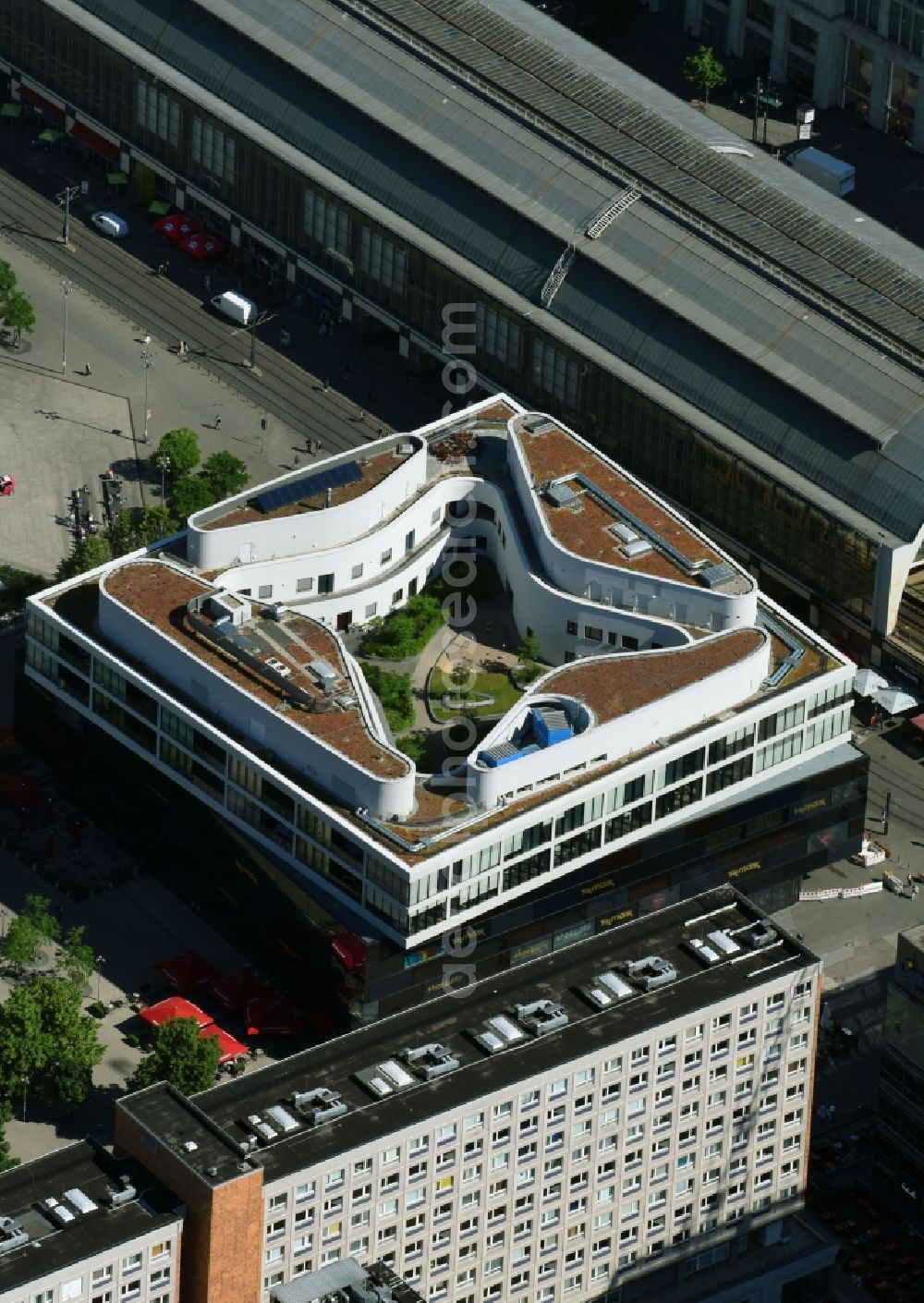 Aerial image Berlin - Residential and commercial building Alea 101 of Redevco Services Deutschland GmbH on regional train station Alexanderplatz in Berlin, Germany