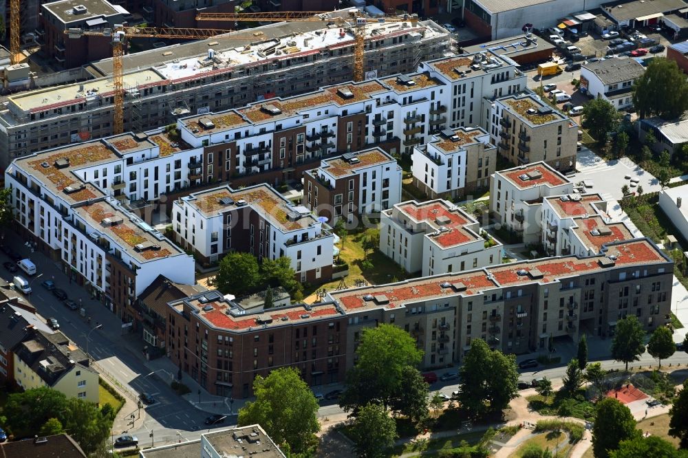 Aerial image Hamburg - Residential and commercial building district along the Koenigsreihe - Muehlenstieg - Wandsbeker Koenigstrasse in Brauhausviertel in the district Wandsbek in Hamburg, Germany