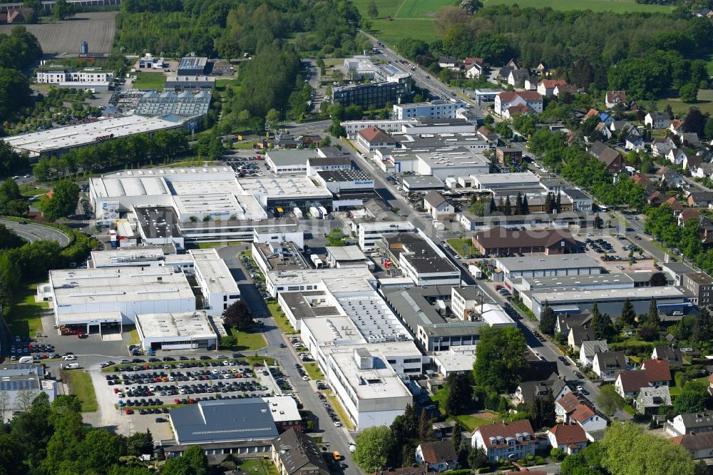 Aerial photograph Bielefeld - Residential and commercial building district along of Guetersloher Strasse in the district Brackwede in Bielefeld in the state North Rhine-Westphalia, Germany