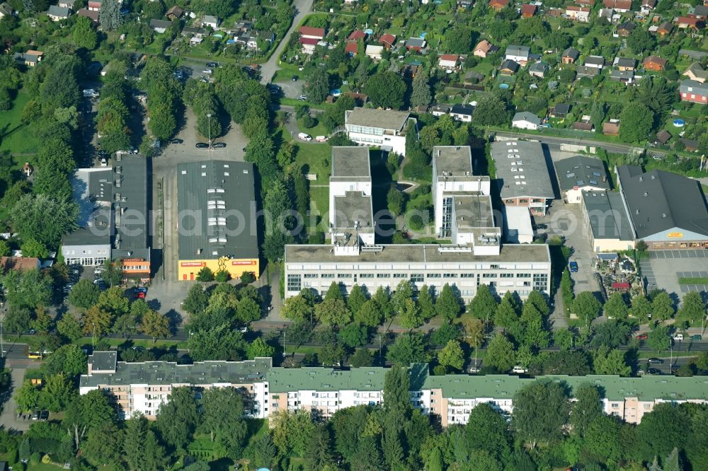 Berlin from above - Residential and commercial building district along on Buckower Donm in the district Neukoelln in Berlin, Germany