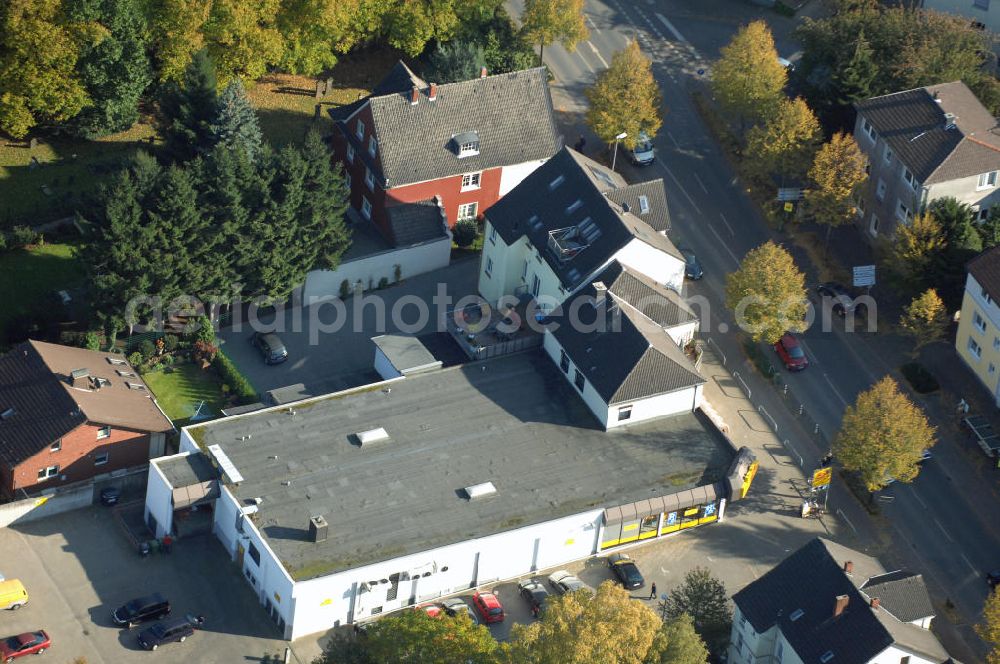 Unna from the bird's eye view: Wohn- und Geschäftshauskomplex an der Massener Strasse 61 in 59423 Unna - ein Projekt der Unternehmensgruppe Markus Gerold an der Vaerstbrücke 1 in 59425 Unna.