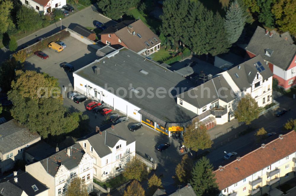 Unna from the bird's eye view: Wohn- und Geschäftshauskomplex an der Massener Strasse 61 in 59423 Unna - ein Projekt der Unternehmensgruppe Markus Gerold an der Vaerstbrücke 1 in 59425 Unna.