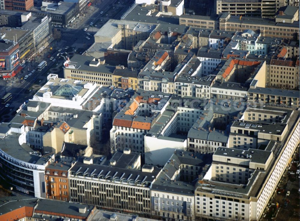 Aerial photograph Berlin - Residential and commercial building complex Tauentzienstrasse - Augsburger Strasse in Berlin. The picture shows the semicircular facade of the Berlin Vereinsbank and the building complex of the hotel Steigenberger Berlin