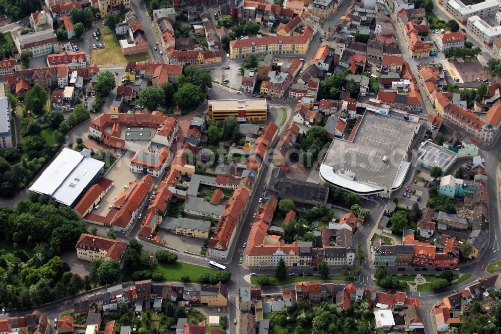 Aerial image Apolda - There is a center near residential and business district, between the Darrplatz and the Heidenberg in Apolda. The determining factor in this area, the shopping center KAUFLAND with its parking deck on the roof. There is the Stadthallel Apolda at the Klause Street