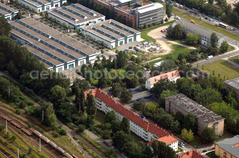 Aerial image Berlin - Blick auf das Wohn- und Industriegebiet an der Bahntrasse Niederschöneweide im Bereich der Landfliegerstrasse, Pilotenstraße, Hagedornstraße und Groß-Berliner Damm. Eine Immobilie der HVB Immobilien AG