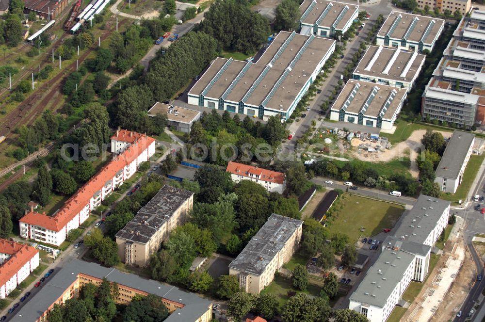 Berlin from the bird's eye view: Blick auf das Wohn- und Industriegebiet an der Bahntrasse Niederschöneweide im Bereich der Landfliegerstrasse, Pilotenstraße, Hagedornstraße und Groß-Berliner Damm. Eine Immobilie der HVB Immobilien AG