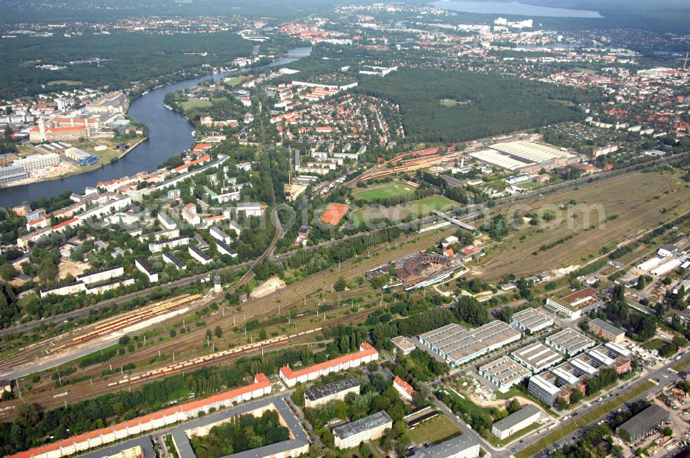 Aerial photograph Berlin - Blick auf das Wohn- und Industriegebiet an der Bahntrasse Niederschöneweide im Bereich der Landfliegerstrasse, Pilotenstraße, Hagedornstraße und Groß-Berliner Damm. Eine Immobilie der HVB Immobilien AG