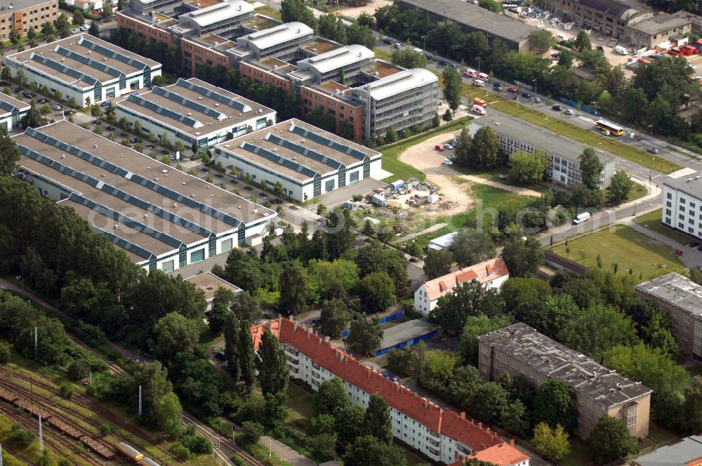 Aerial photograph Berlin - Blick auf das Wohn- und Industriegebiet an der Bahntrasse Niederschöneweide im Bereich der Landfliegerstrasse, Pilotenstraße, Hagedornstraße und Groß-Berliner Damm. Eine Immobilie der HVB Immobilien AG