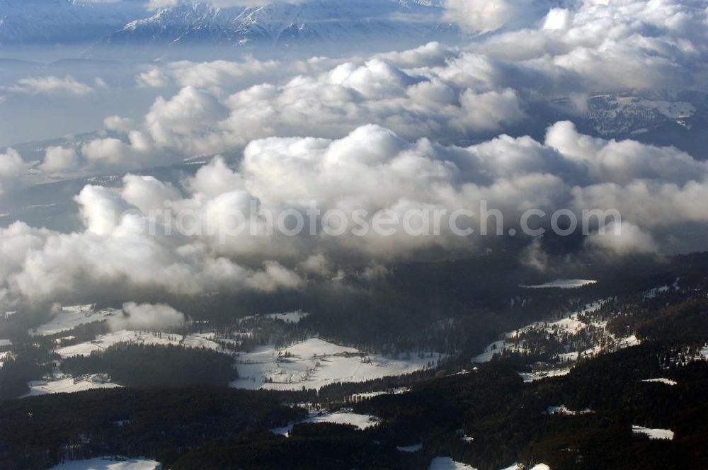 Aerial photograph San Costantino - Wolkenfelder über dem winterlich verschneiten Regionen des Schlern- Gebirgsmassives bei San Costantino in Italien.