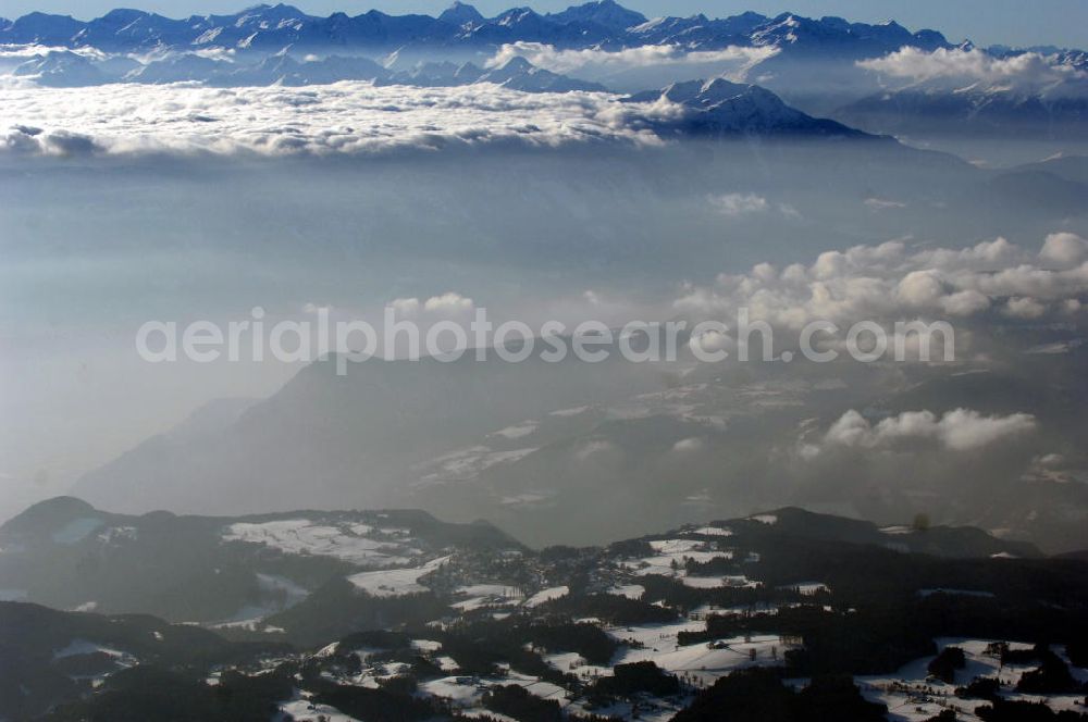 Aerial image San Costantino - Wolkenfelder über dem winterlich verschneiten Regionen des Schlern- Gebirgsmassives bei San Costantino in Italien.