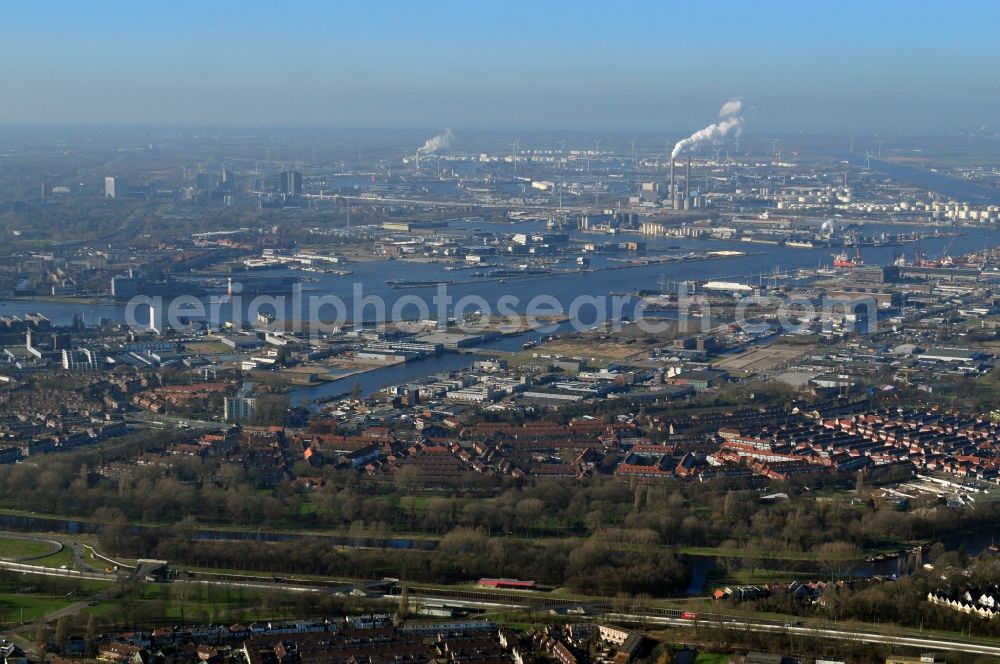 Amsterdam from the bird's eye view: District view of a residential and industrial area in Amsterdam Noord with view of the port Houthaven in Amsterdam in the province of North Holland in the Netherlands. The Houthaven is located in the western port area Westpoort at the river IJ