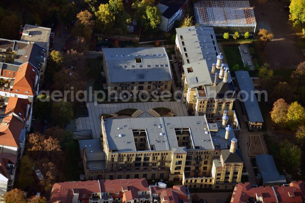 Berlin from above - View of a residential complex in the renovated building of the old malthouse between Muhlenstrasse and Neue Schonholzer Strasse in Berlin - Pankow. The first construction phase of the yellow brick building dates back to the year 1874 when it was designed for the purpose of industrial malting. The Terraplan Estate Company has refurbished the landmark and converted it into modern flats, suites and lofts