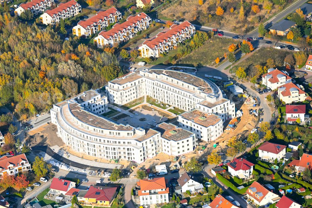 Schwanebeck from the bird's eye view: Multi-family residential complex Am Eichenring in Schwanebeck in the federal state of Brandenburg, Germany