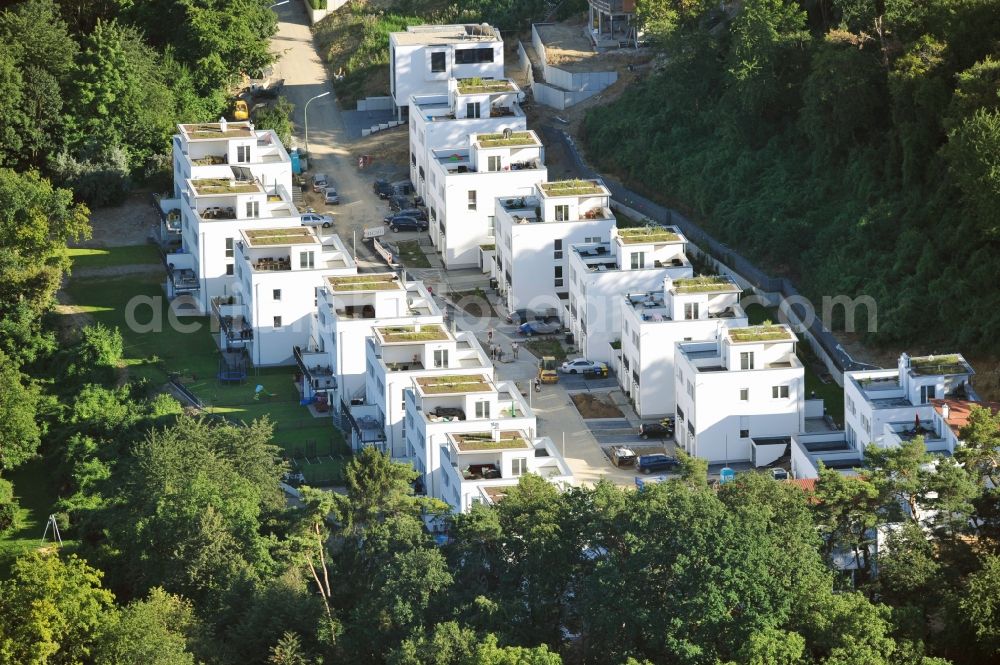 Aerial photograph Bad Vilbel - View the construction site of the residental complex on Tannenweg. At the forest are several new residential buildings built by the CDS Wohnbau GmbH, a Frankfurt real estate service provider