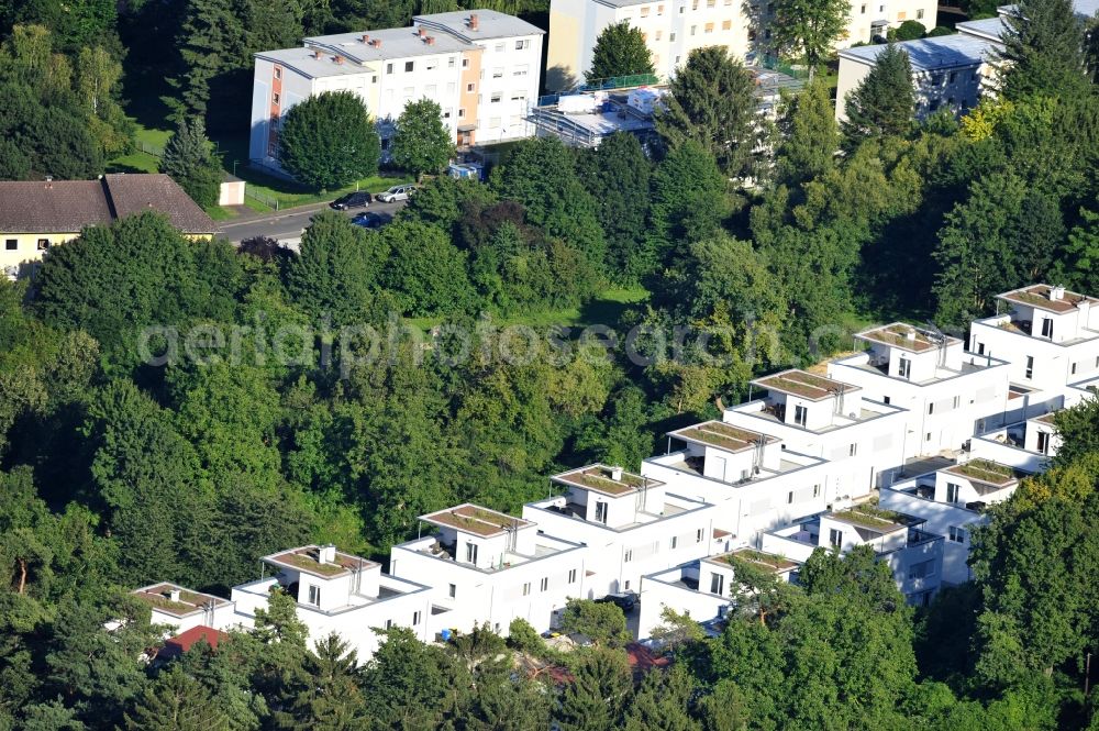 Aerial photograph Bad Vilbel - View the construction site of the residental complex on Tannenweg. At the forest are several new residential buildings built by the CDS Wohnbau GmbH, a Frankfurt real estate service provider