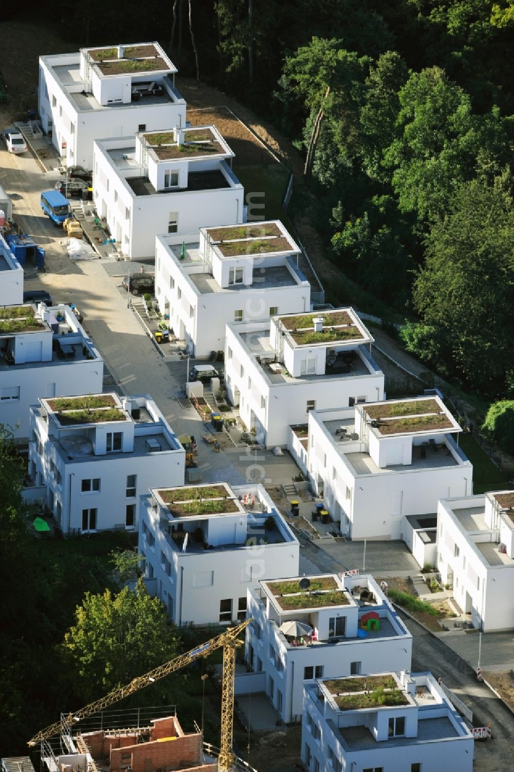 Bad Vilbel from above - View the construction site of the residental complex on Tannenweg. At the forest are several new residential buildings built by the CDS Wohnbau GmbH, a Frankfurt real estate service provider