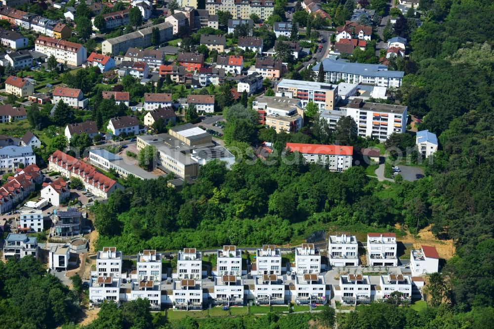 Bad Vilbel from above - View the construction site of the residental complex on Tannenweg. At the forest are several new residential buildings built by the CDS Wohnbau GmbH, a Frankfurt real estate service provider