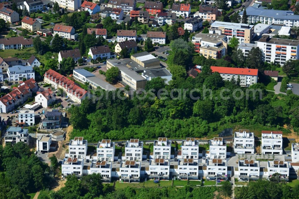 Bad Vilbel from the bird's eye view: View the construction site of the residental complex on Tannenweg. At the forest are several new residential buildings built by the CDS Wohnbau GmbH, a Frankfurt real estate service provider