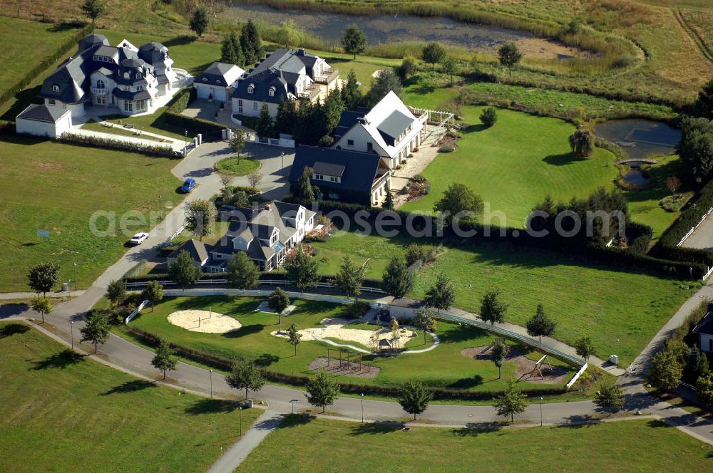 Michendorf from the bird's eye view: Blick auf die Wohnanlagen der HVB Immobilien am Areal des malerisch gelegenen Golf- und Country Club Seddiner See. Anschrift: Golf- und Country Club Seddiner See AG,Zum Weiher 44, 14552 Michendorf,Tel: 033205 / 73 20,Fax: 033205 / 73 229