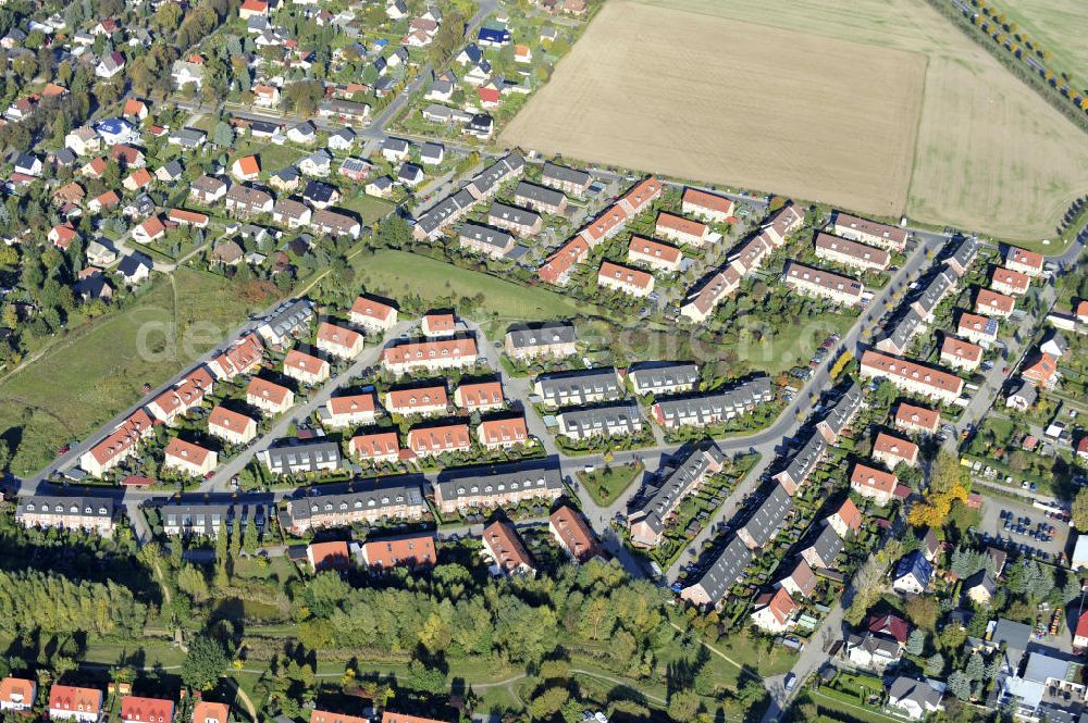 Aerial image Ahrensfelde - Wohngebiet Ahrensfelder Dreieck der Firma City Bauten im Bereich Fasanenstraße / Kirschenallee / Am Wuhlegrund querab der Bundesstraße B158 (Blumberger Chaussee). Housing area Ahrensfelder Dreieck of the company City Bauten in the area of Fasanenstraße / Kirschenallee / Am Wuhlegrund besides of the federal highway B158.