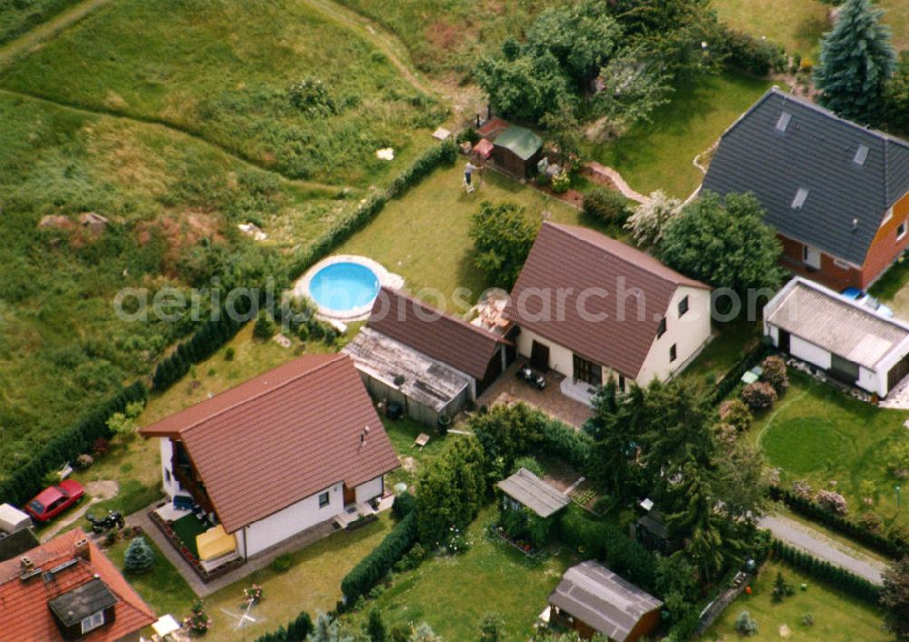 Aerial image Berlin-Mahlsdorf - Blick auf das Wohngebiet an der Dahlwitzer Straße - Lübzerstraße in Berlin-Mahlsdorf. View of the residential area at the street Dahlwitzer Strasse in the district Mahlsdorf.