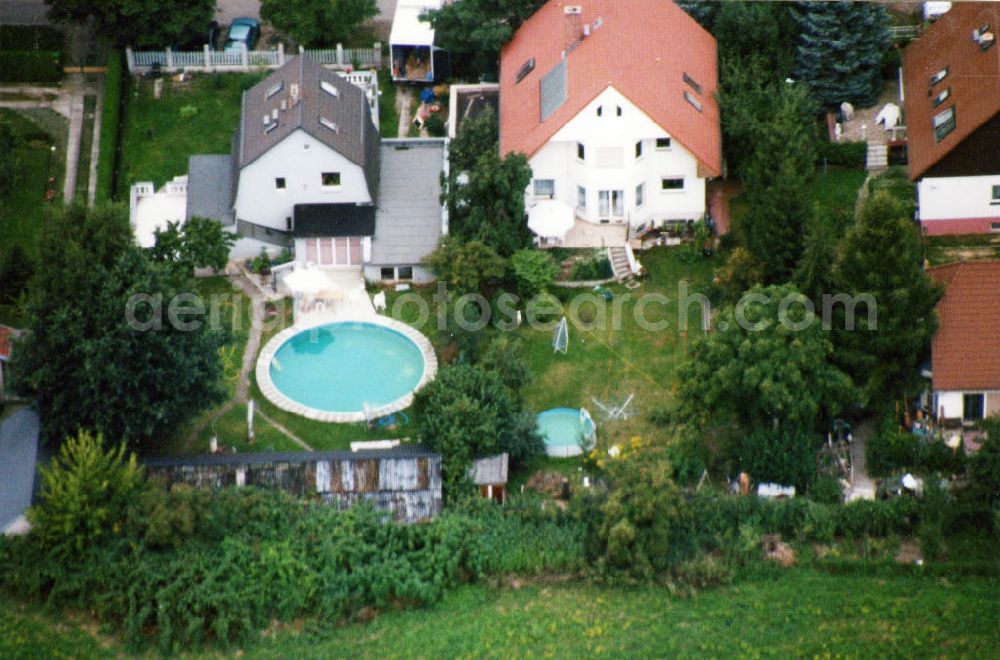 Berlin-Mahlsdorf from above - Blick auf das Wohngebiet an der Lortzingstraße in Berlin-Mahlsdorf. View of the residential area at the street Lortzingstrasse in the district Mahlsdorf.