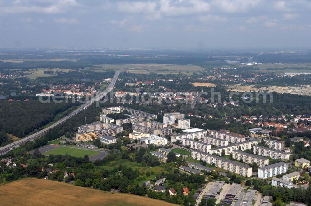 Aerial image Rüdersdorf - Blick auf das Wohngebiet Brückenstraße / Friedrich-Engels-Ring in Rüdersdorf. Die Siedlung entstand in den 70er Jahren im Zusammenhang mit der Erweiterung des nahegelegenen Kalksteintagebaus. Eigentümer ist die Wohnungsbaugesellschaft Rüdersdorf mbH. Kontakt: Tel. +49(0)33638 7570, Email: info@wbg-ruedersdorf.de