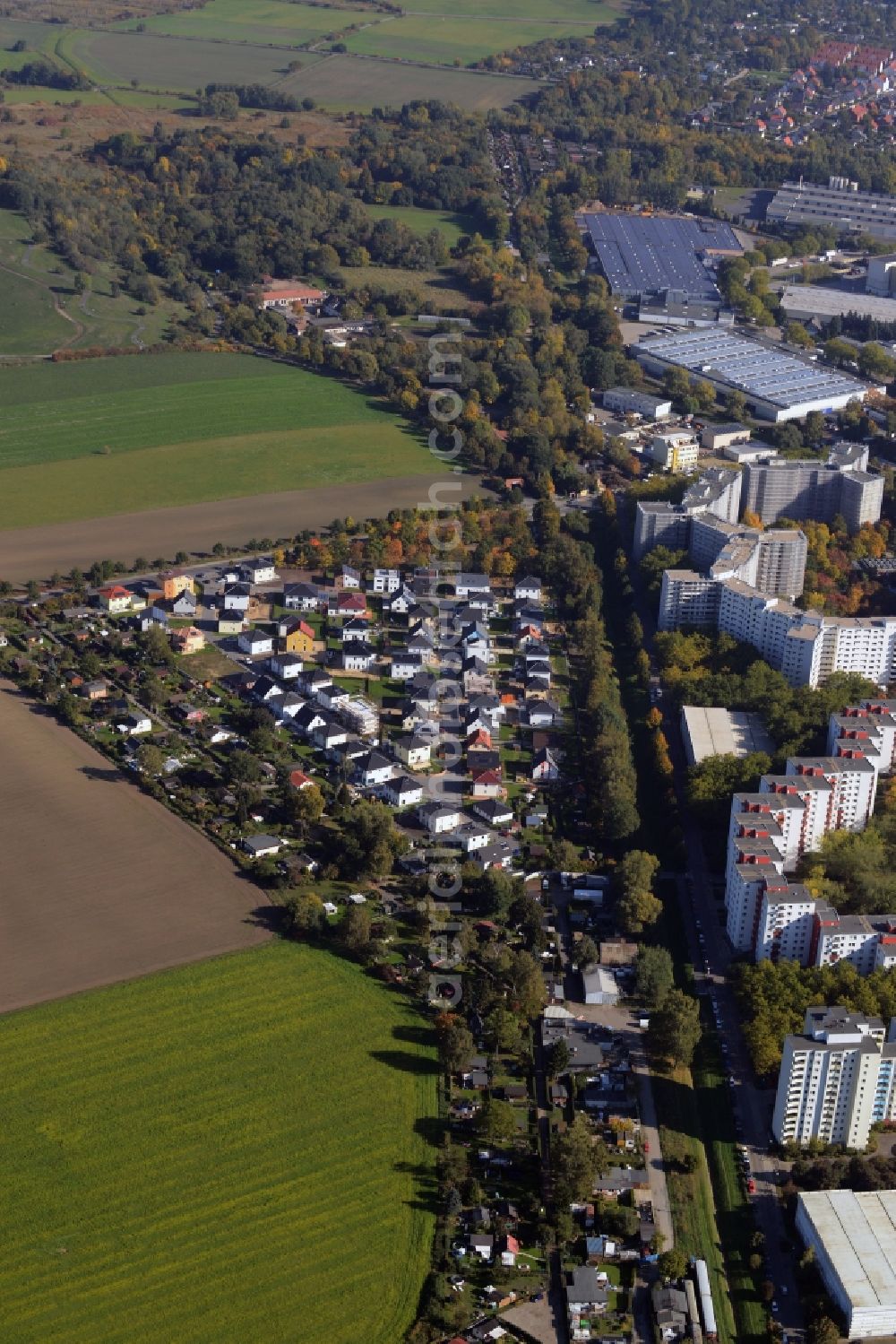 Berlin from above - Single-family residential area of settlement at the Rodelberg adverse of the building made with precast concrete slabs - high rise - housing estate Luebars in Berlin in Germany