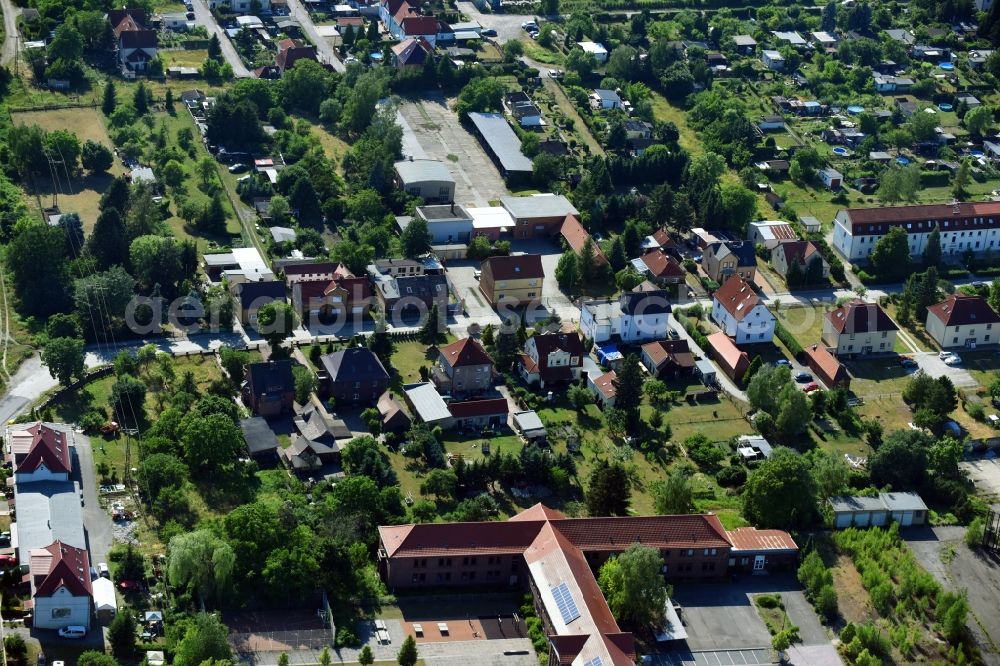 Großräschen from the bird's eye view: Single-family residential area of settlement along the Muehlenstrasse in Grossraeschen in the state Brandenburg, Germany