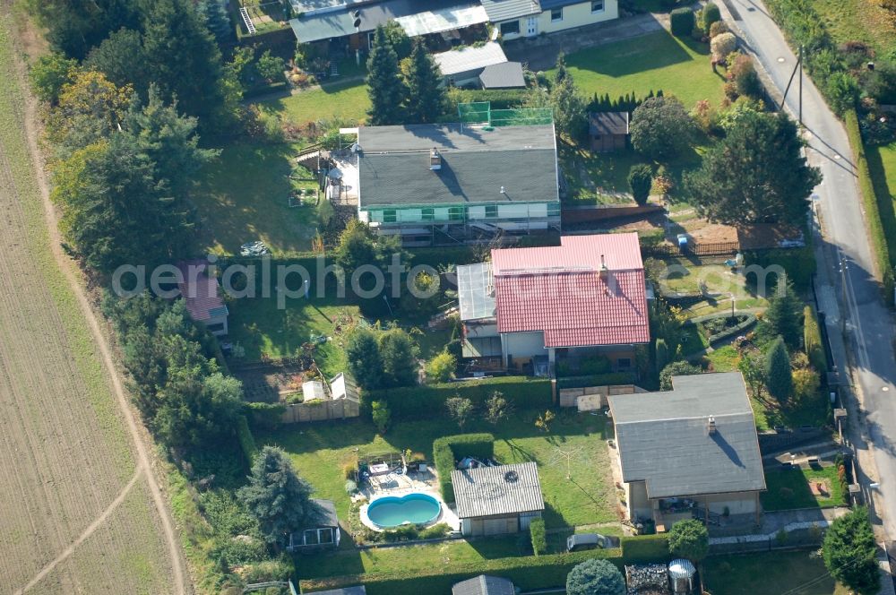 Aerial image Berlin - Single-family residential area of settlement on Siedlungsring, Bucher Chaussee, Erekweg, Swantewitstrasse, Zum Kappgraben, Lanzelotstrasse in the district Karow in Berlin, Germany