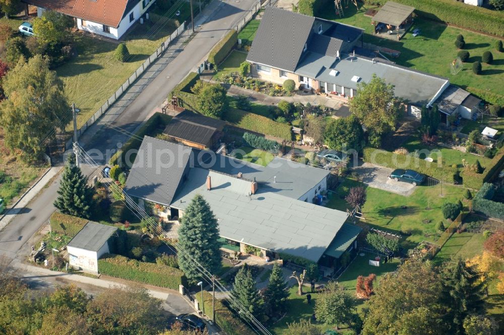 Berlin from the bird's eye view: Single-family residential area of settlement on Siedlungsring, Bucher Chaussee, Erekweg, Swantewitstrasse, Zum Kappgraben, Lanzelotstrasse in the district Karow in Berlin, Germany