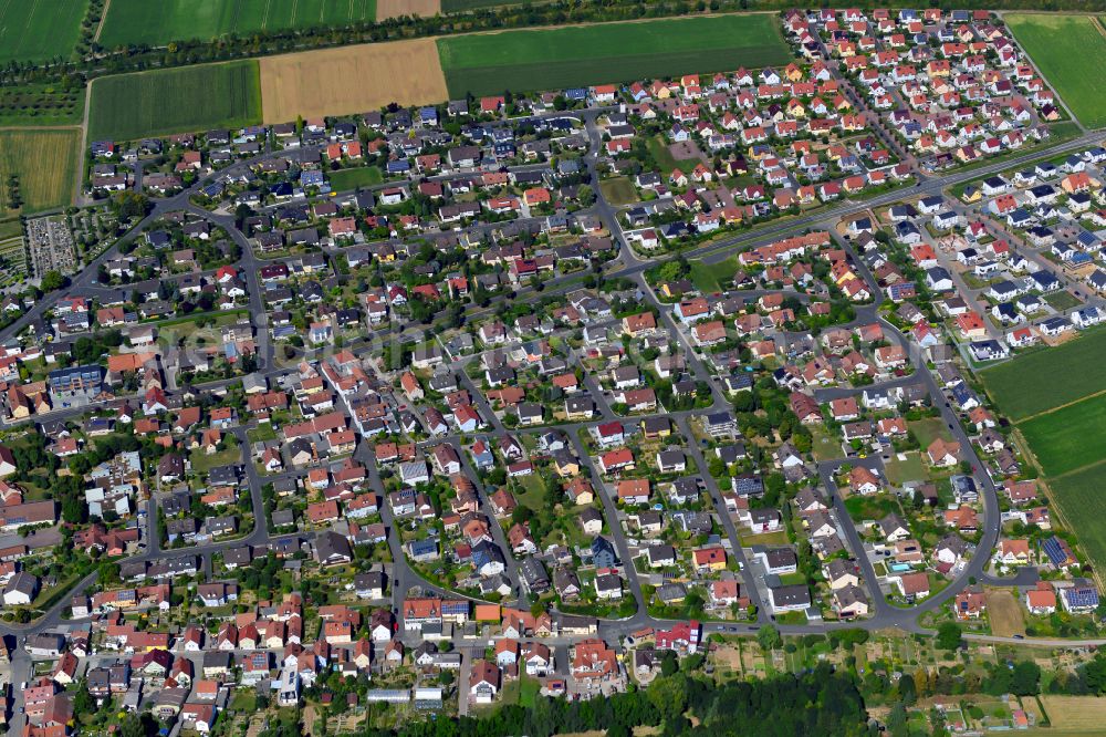 Aerial photograph Kürnach - Single-family residential area of settlement on the edge of agricultural fields in Kürnach in the state Bavaria, Germany