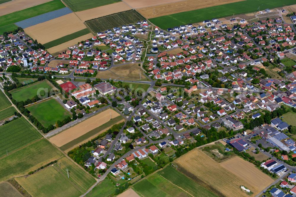 Aerial photograph Unterpleichfeld - Single-family residential area of settlement on the edge of agricultural fields in Unterpleichfeld in the state Bavaria, Germany