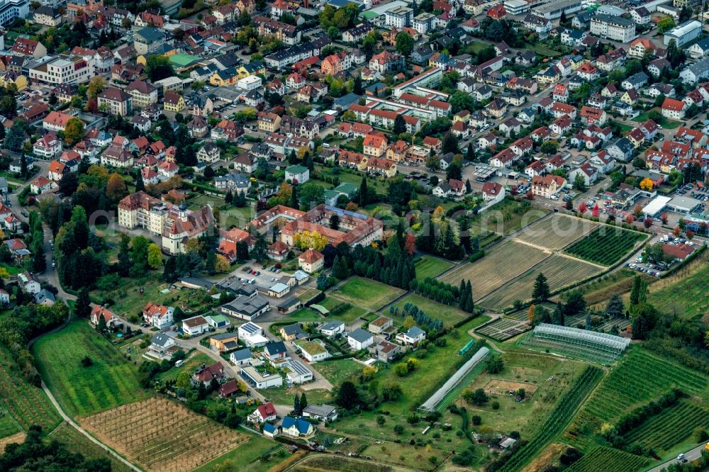 Aerial image Bühl - Construction sites for new construction residential area of detached housing estate Sonnhalde with Kloster in background in Buehl in the state Baden-Wurttemberg, Germany