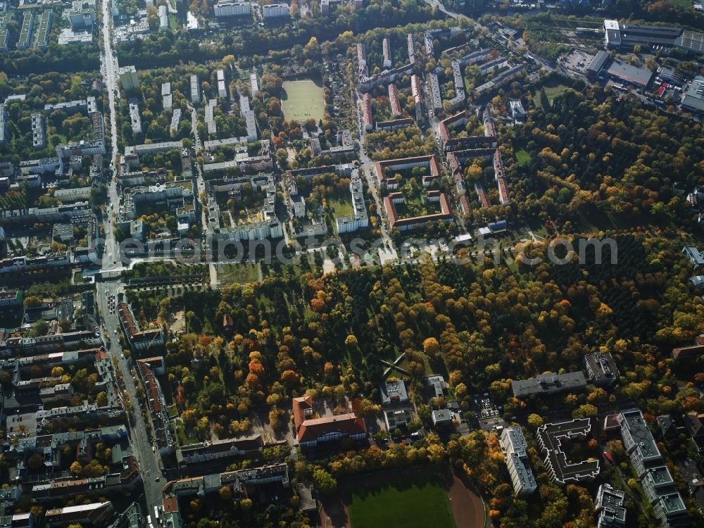 Berlin from above - Residential area around Mariendorfer Weg in the Neukoelln part of Berlin in Germany. The residential estates are located amidst other residential buildings and company compounds. The large green area consists of churchyards of two churches. It is located in the West of Hermannstrasse